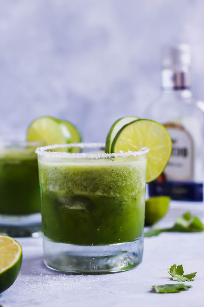 These Cilantro Cucumber Margaritas are a cool, refreshing twist on this classic cocktail! The cucumber is blended in for ultimate flavor. These pair perfectly with chips & salsa!