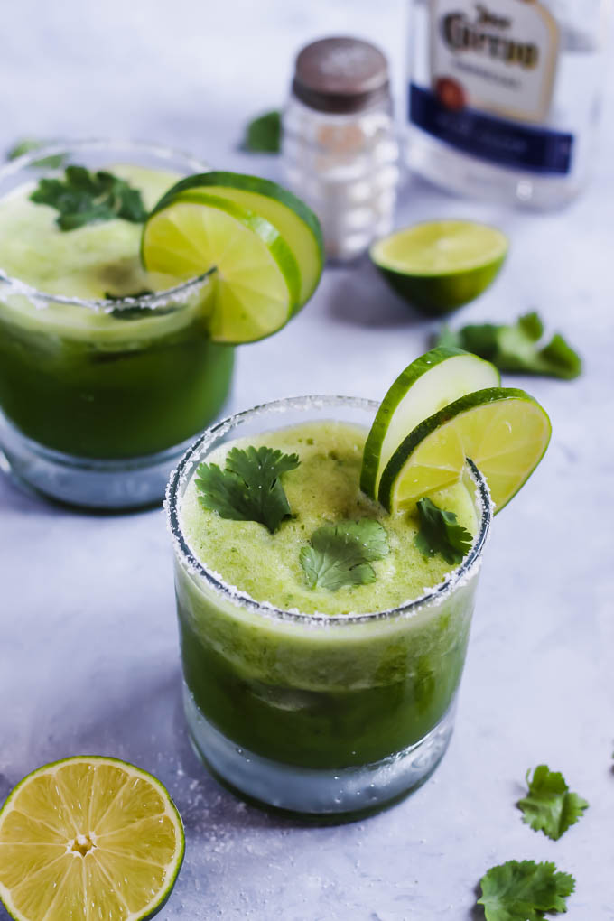 These Cilantro Cucumber Margaritas are a cool, refreshing twist on this classic cocktail! The cucumber is blended in for ultimate flavor. These pair perfectly with chips & salsa!