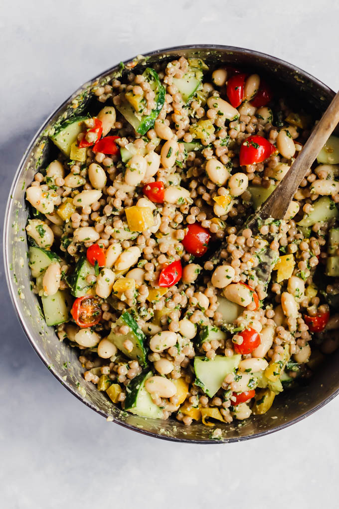 Whip up this colorful Pesto Couscous Salad for an easy lunch or dinner packed with fresh vegetables, whole grains and beans. It’s done in under 30 minutes! (vegan)