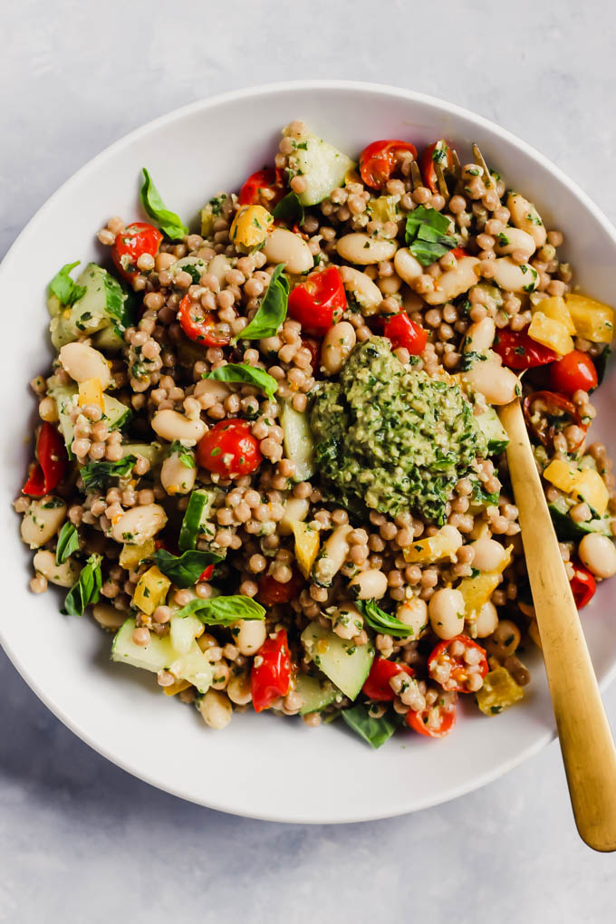 Whip up this colorful Pesto Couscous Salad for an easy lunch or dinner packed with fresh vegetables, whole grains and beans. It’s done in under 30 minutes! (vegan)