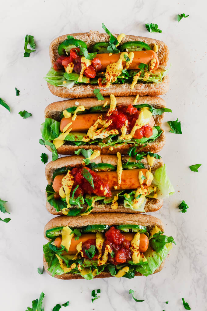 Take summer grilling season to the next level with these Taco Style Veggie Dogs! Served on whole-wheat buns and made with veggie dogs, they’re a great meatless option to serve to a crowd. (vegan)