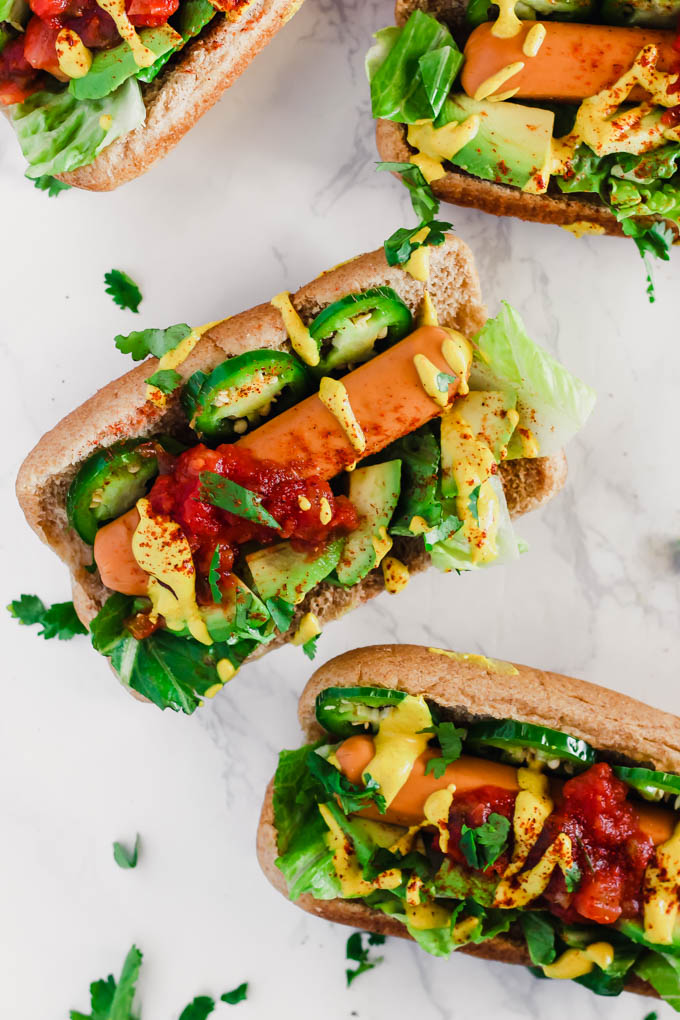 Take summer grilling season to the next level with these Taco Style Veggie Dogs! Served on whole-wheat buns and made with veggie dogs, they’re a great meatless option to serve to a crowd. (vegan)