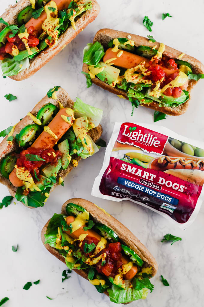 Take summer grilling season to the next level with these Taco Style Veggie Dogs! Served on whole-wheat buns and made with veggie dogs, they’re a great meatless option to serve to a crowd. (vegan)