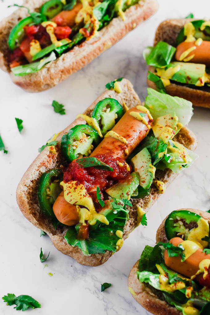 Take summer grilling season to the next level with these Taco Style Veggie Dogs! Served on whole-wheat buns and made with veggie dogs, they’re a great meatless option to serve to a crowd. (vegan)