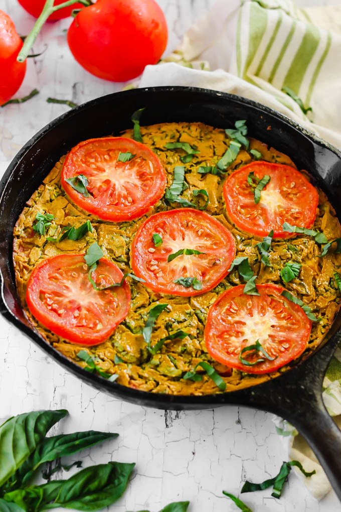 Serve this Vegan Caprese Quiche as a savory breakfast option full of plant protein thanks to chickpea flour and tofu! The seasonal tomatoes and basil make this a delicious, wholesome summer meal. (gluten-free)