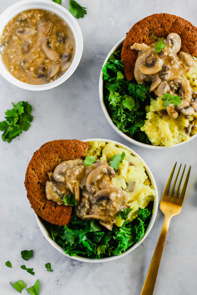 These Vegan Hamburger Steaks make a savory meatless dinner that everyone at the table will love. Serve them with mashed potatoes & mushroom gravy to take them to the next level!