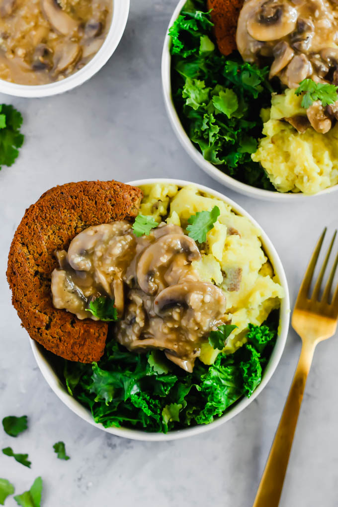 These Vegan Hamburger Steaks make a savory meatless dinner that everyone at the table will love. Serve them with mashed potatoes & mushroom gravy to take them to the next level!