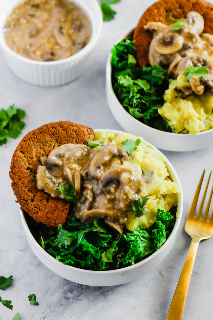 These Vegan Hamburger Steaks make a savory meatless dinner that everyone at the table will love. Serve them with mashed potatoes & mushroom gravy to take them to the next level!