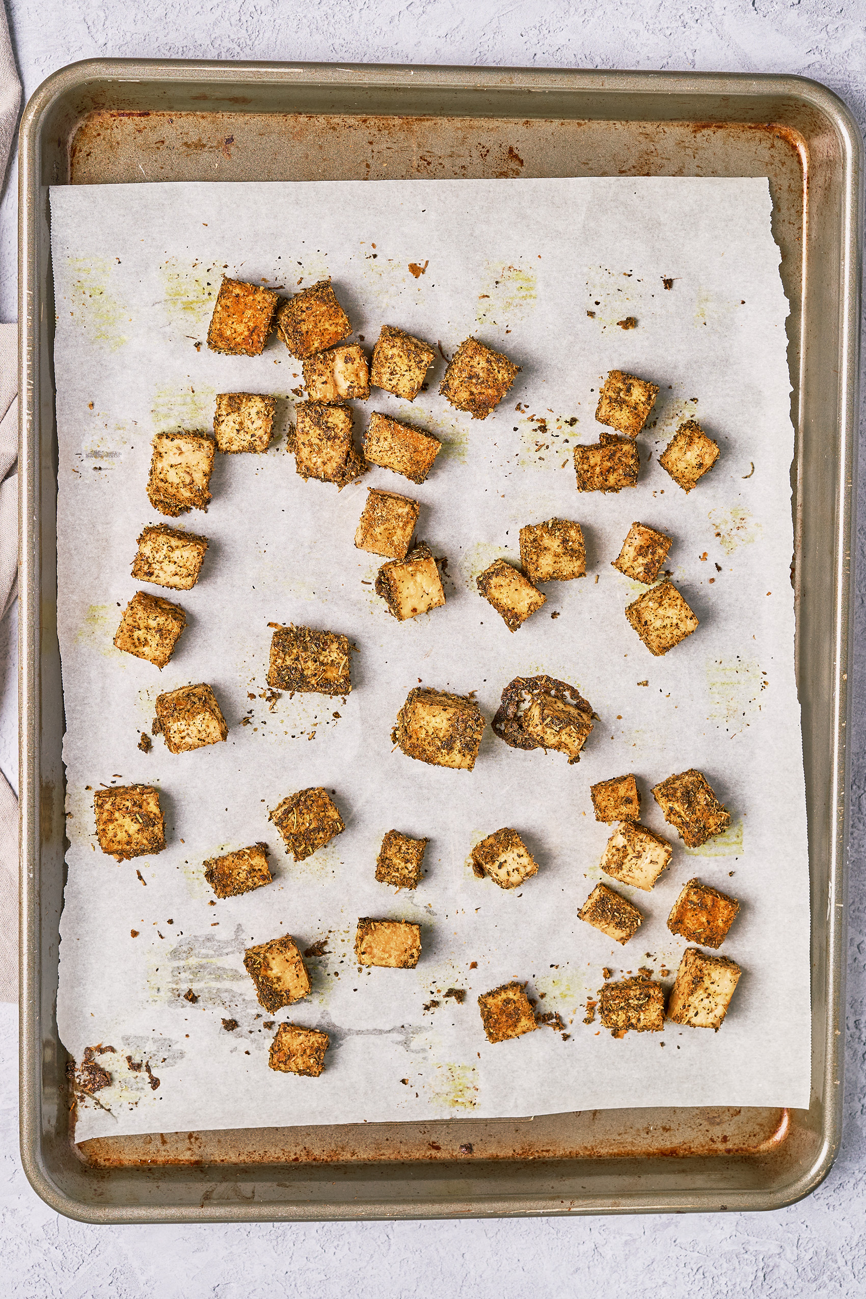 a sheet tray of crispy tofu cubes