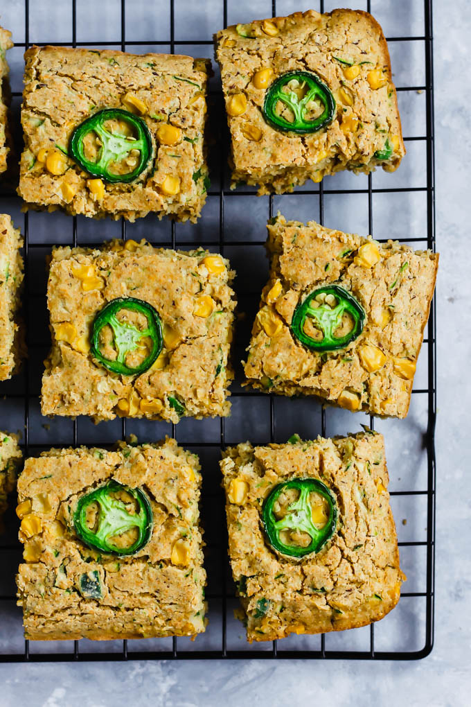 cornbread squares on top of a cooling rack