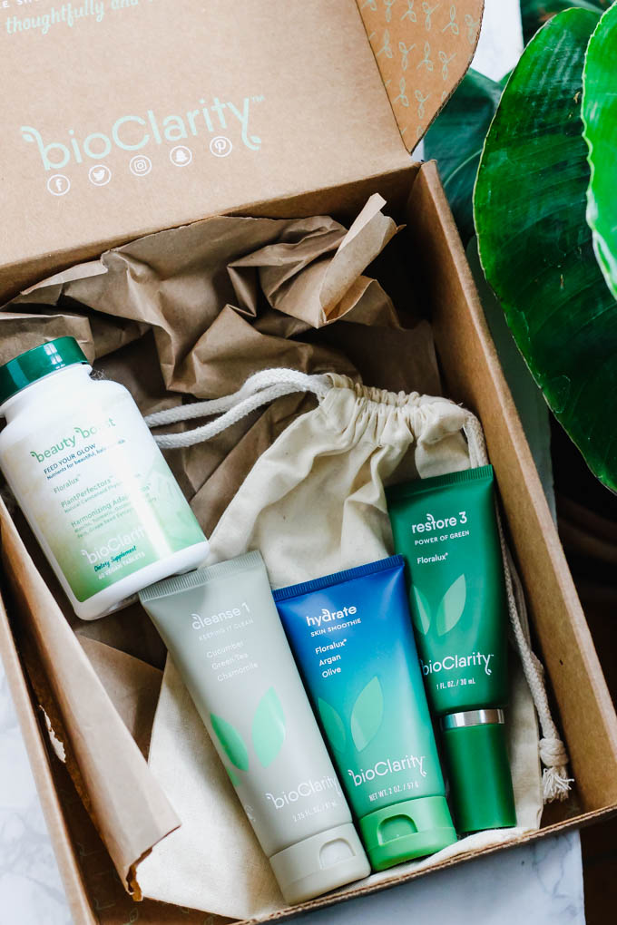 a box of BioClarity skincare products and supplements