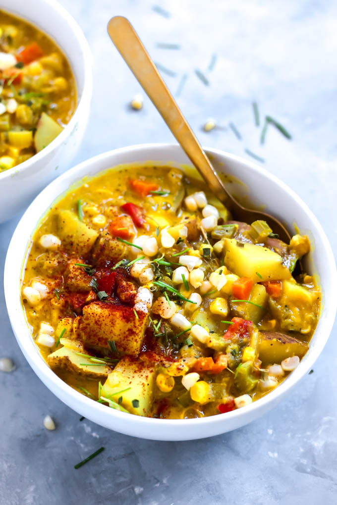 A close up of a bowl of green chile corn chowder