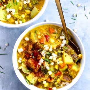 An overhead shot of a bowl of corn chowder