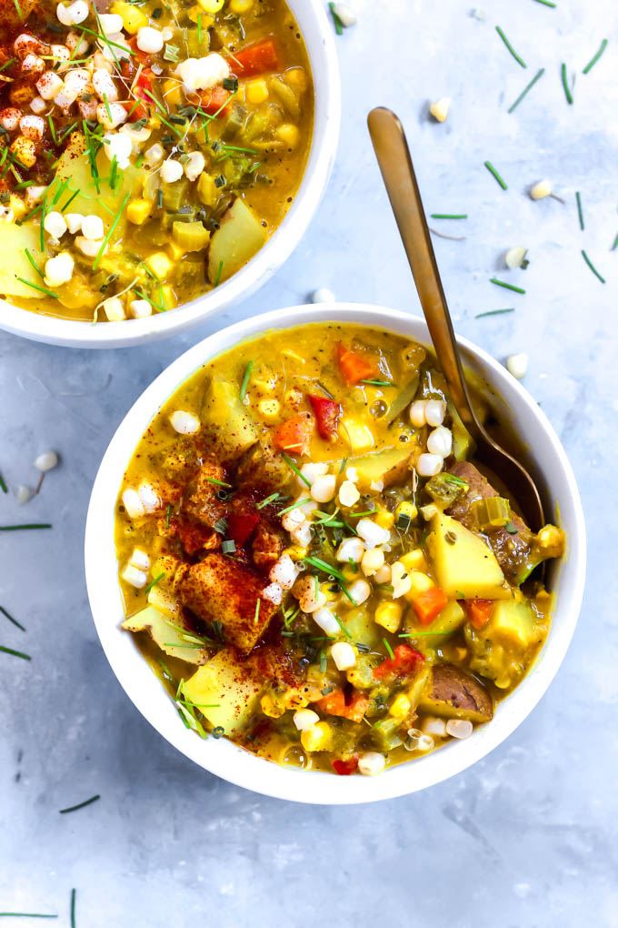 An overhead shot of a bowl of corn chowder