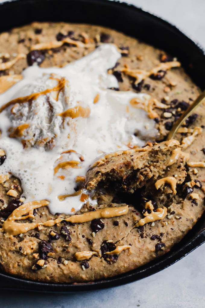 What’s better than a giant cookie? A giant Chocolate Chip Peanut Butter Skillet Cookie! It’s rich and fudgy, but made a bit healthier using oats and lentils. Vegan & gluten-free!