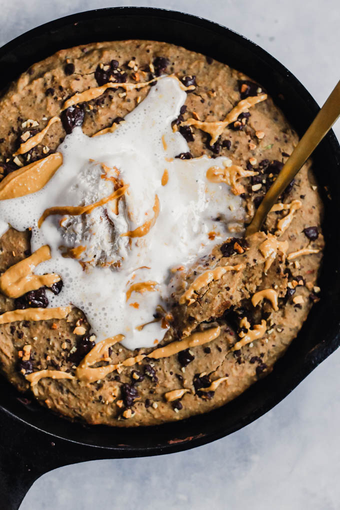 What’s better than a giant cookie? A giant Chocolate Chip Peanut Butter Skillet Cookie! It’s rich and fudgy, but made a bit healthier using oats and lentils. Vegan & gluten-free!