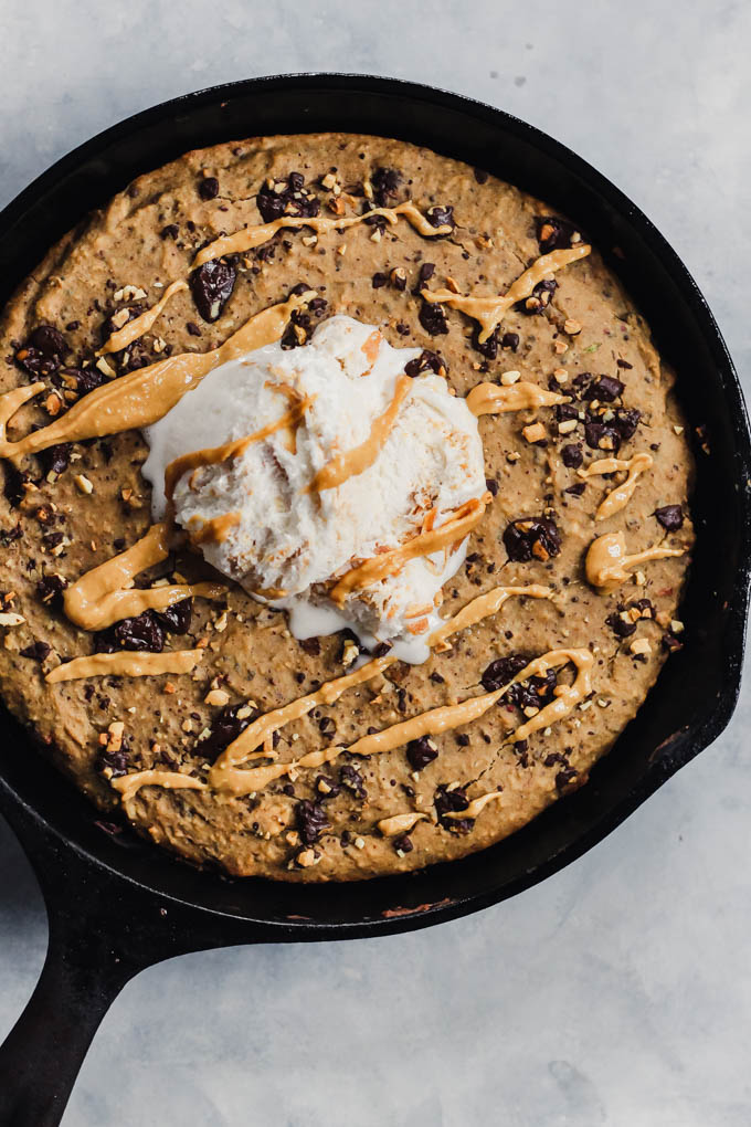 What’s better than a giant cookie? A giant Chocolate Chip Peanut Butter Skillet Cookie! It’s rich and fudgy, but made a bit healthier using oats and lentils. Vegan & gluten-free!