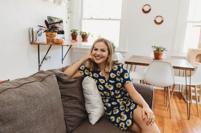 Check out my renter-friendly, affordable apartment makeover—from basic and beige to a bright, boho, modern space full of plants and DIYs!