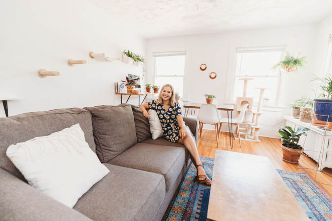Check out my renter-friendly, affordable apartment makeover—from basic and beige to a bright, boho, modern space full of plants and DIYs! 