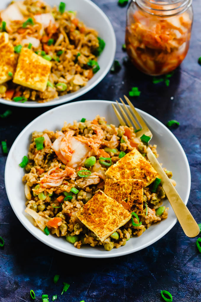 Two bowls of vegan kimchi fried rice