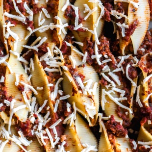 a casserole dish filled with stuffed shells