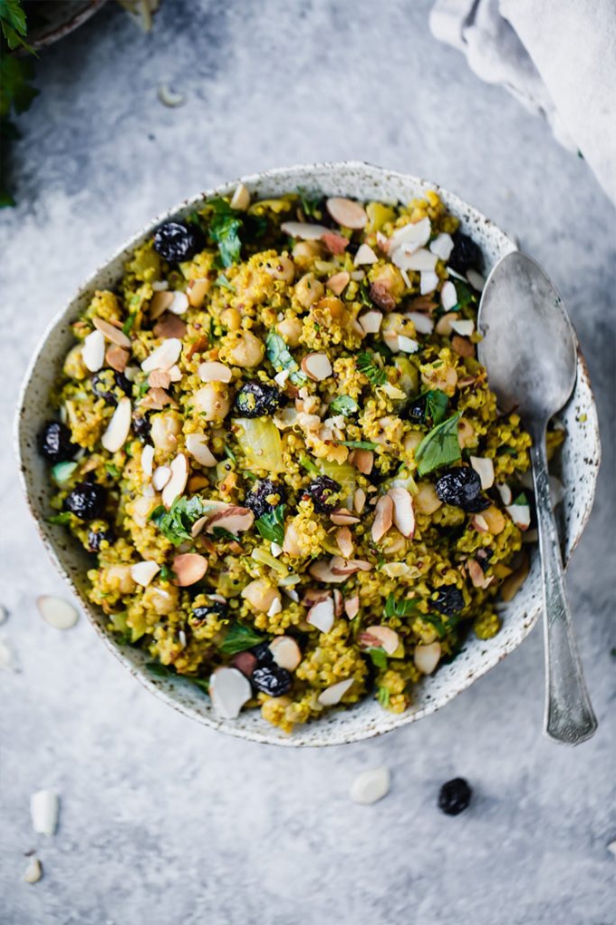 An overhead shot of a bowl of Moroccan quinoa chickpea salad