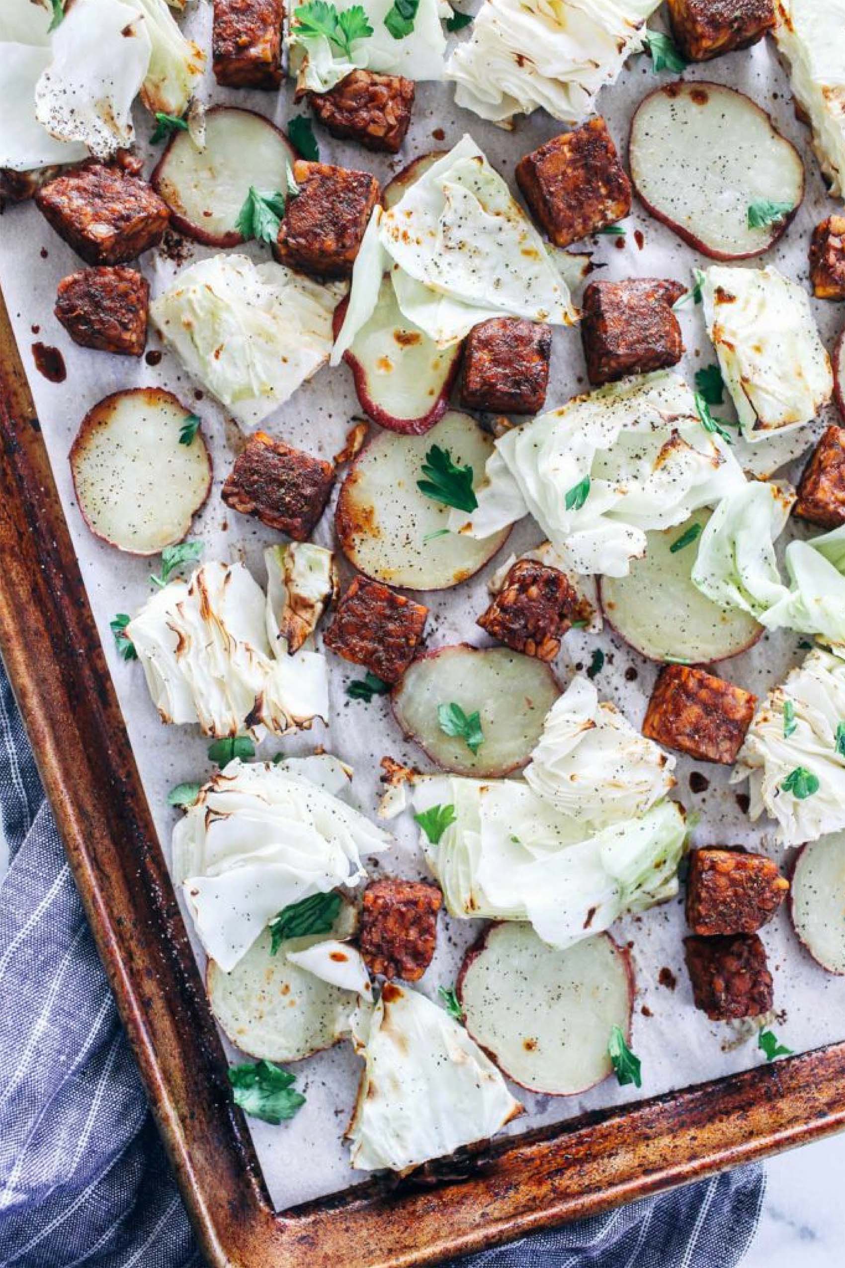 a sheet tray of cabbage and tempeh