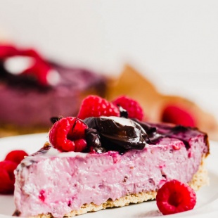 This Vegan Raspberry Cheesecake is a decadent dessert to share with the ones you love! It features a creamy, fruity filling made with a secret ingredient. (gluten-free)