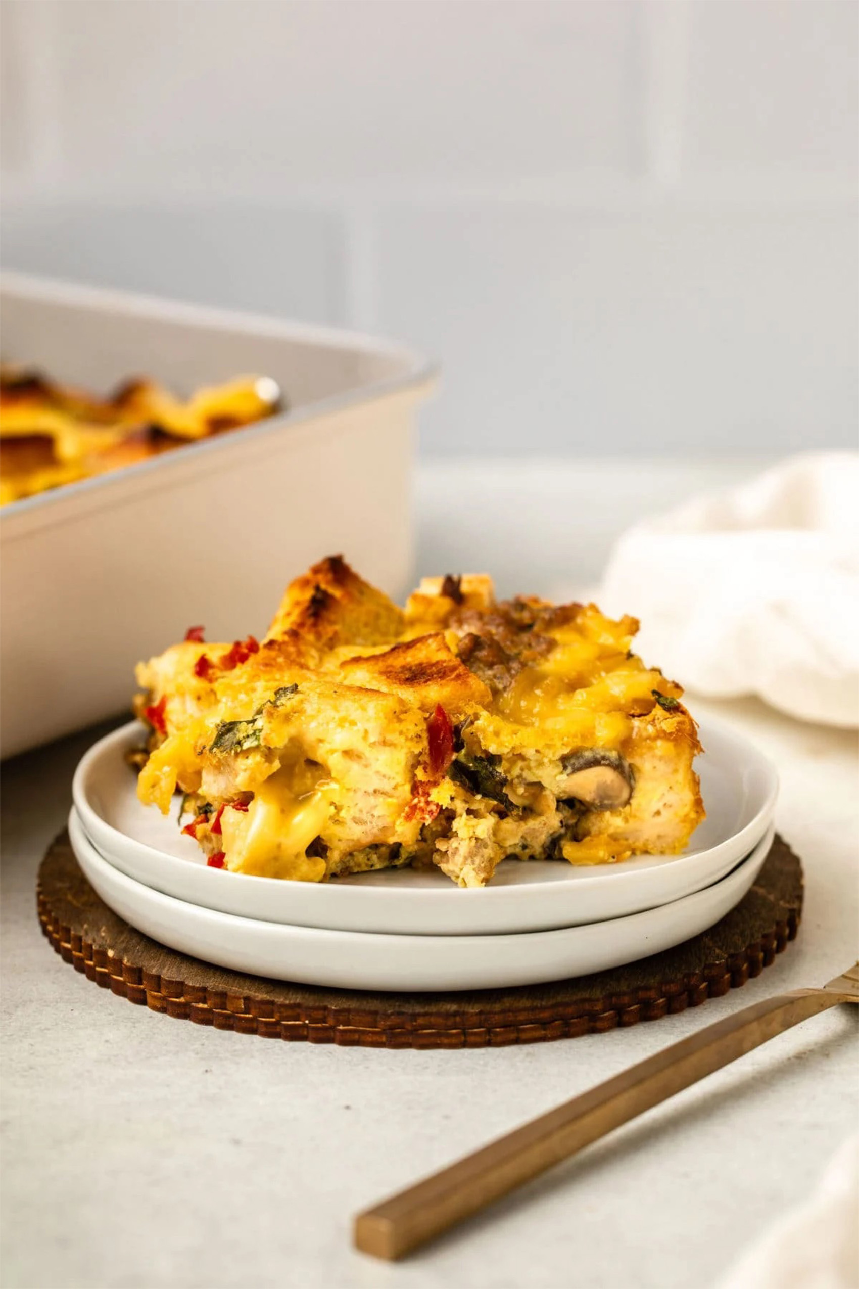 a plate with a slice of vegan egg strata