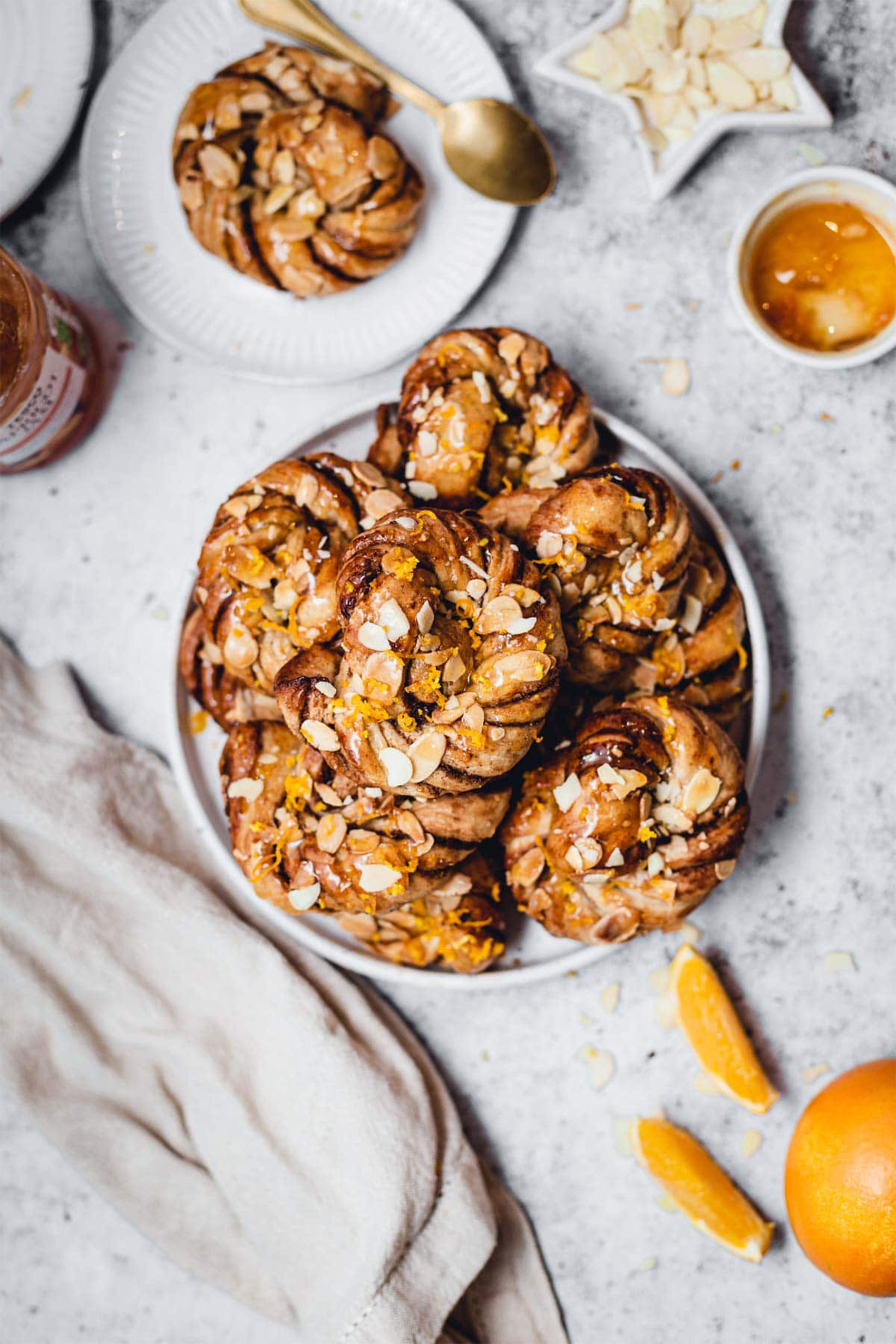 a plate of vegan cardamom buns