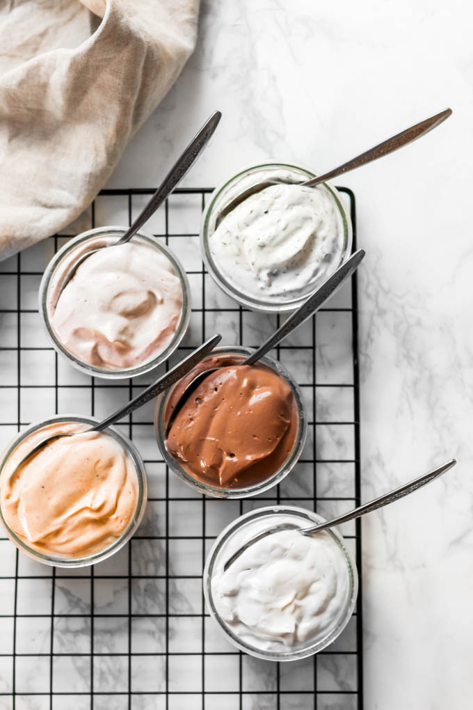 Save some money by making your own vegan cream cheese! Made with tofu and cashews, these cream cheese recipes are wholesome spreads for toast, crackers and more. 5 flavors included in the post!