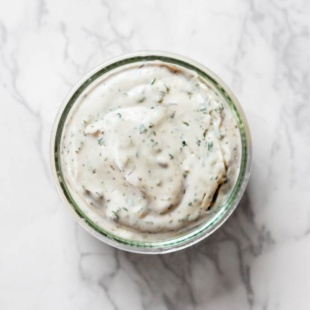 a bowl of garlic and herb tofu cream cheese