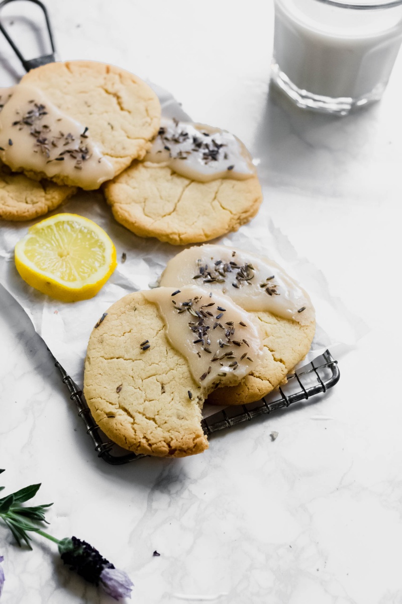 a tray of lemon lavender cookies covered in a lemon lavender glaze