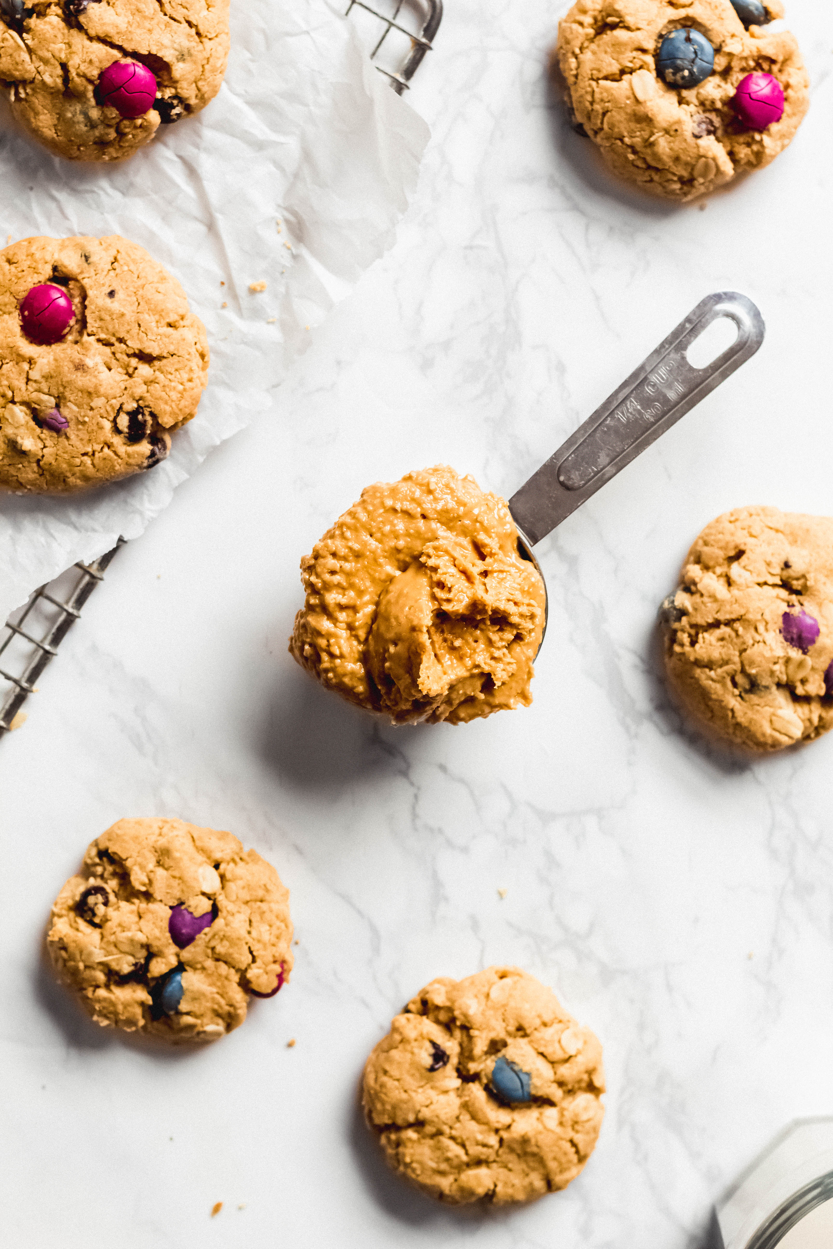 a tablespoon of peanut butter among a batch of monster cookies