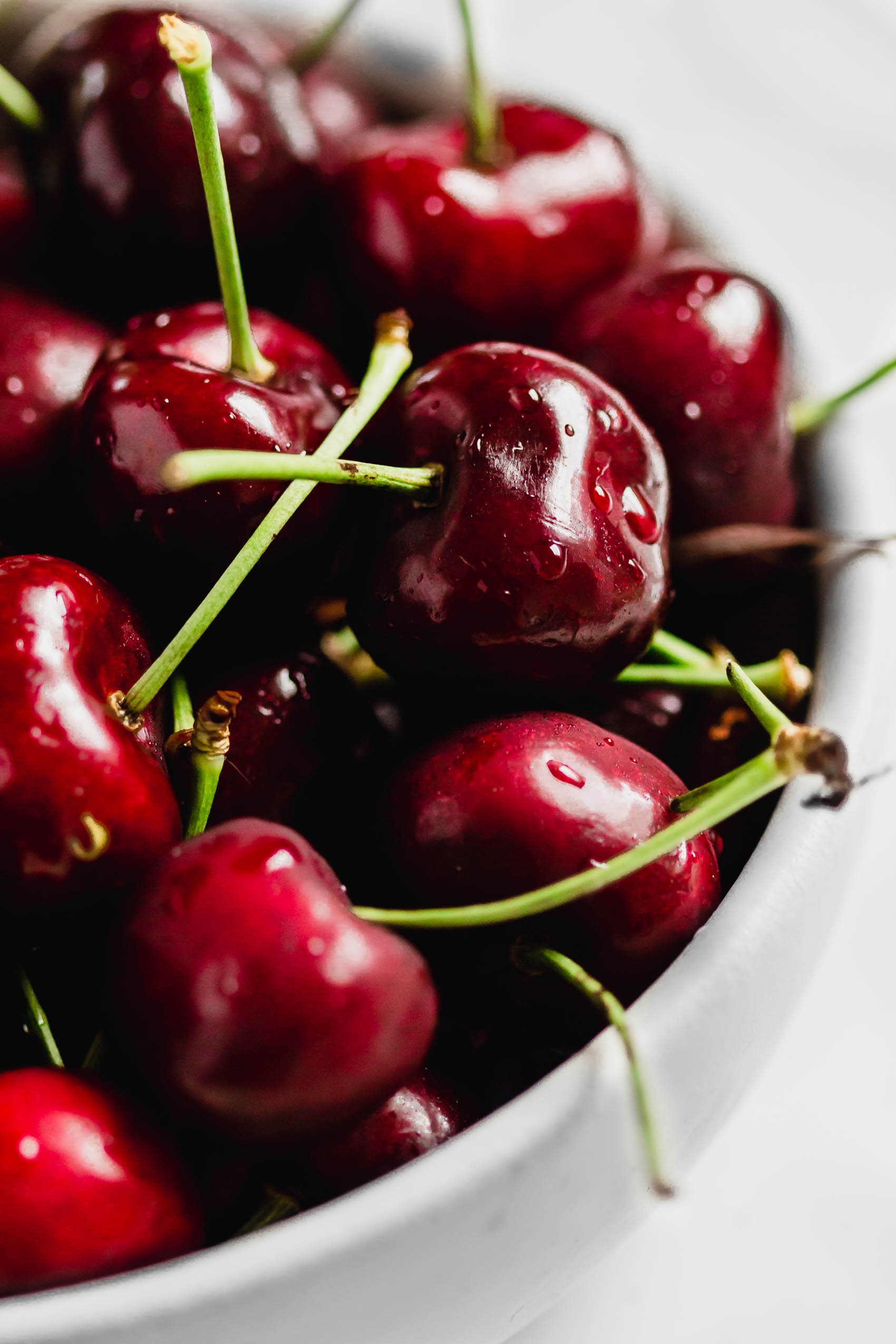 a bowl of fresh sweet cherries