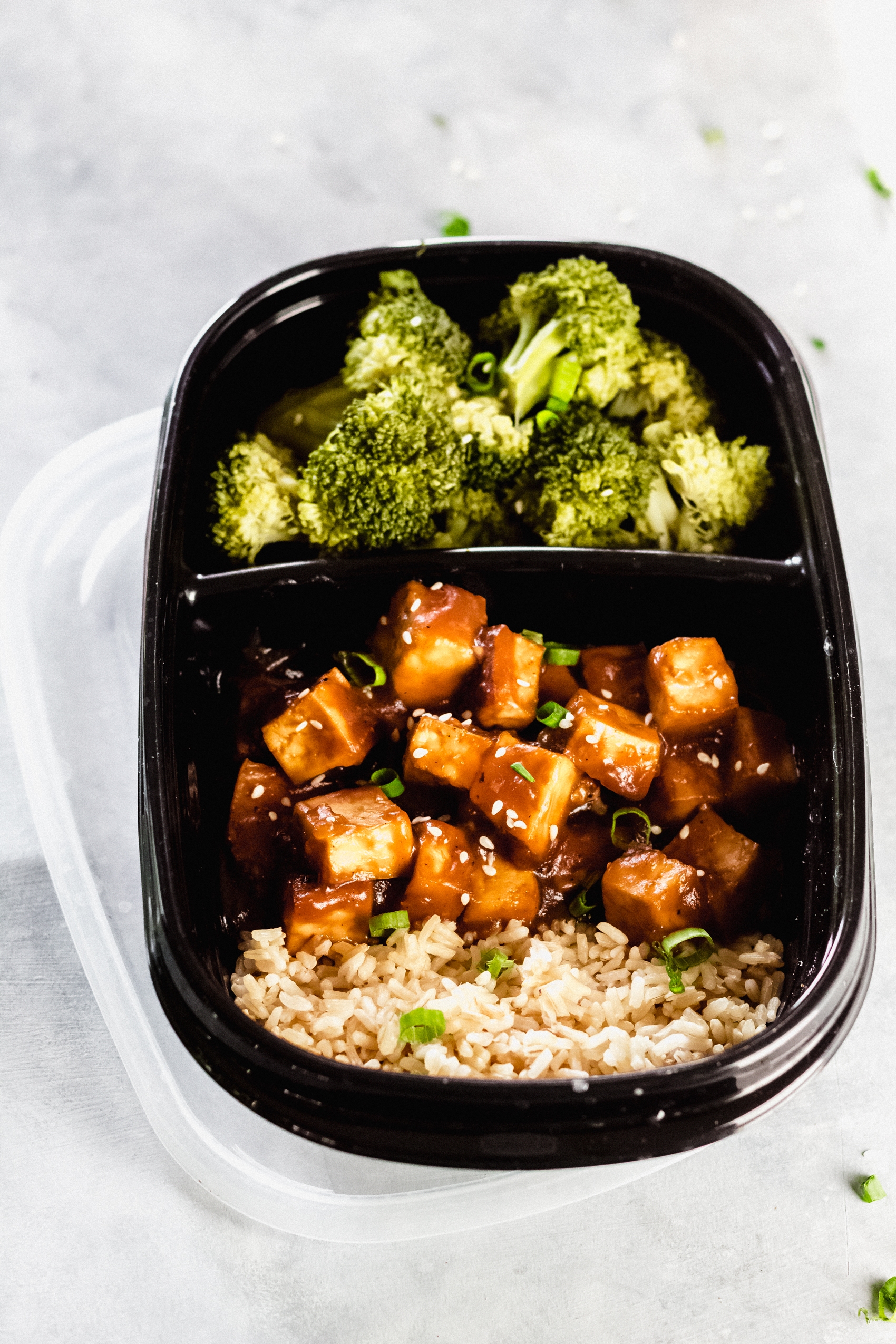 teriyaki sauce on tofu with broccoli and brown rice