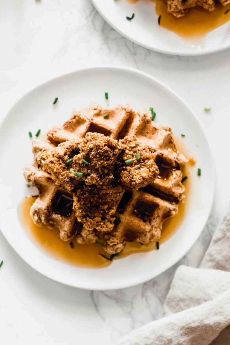 white plate with waffle and tofu chicken 