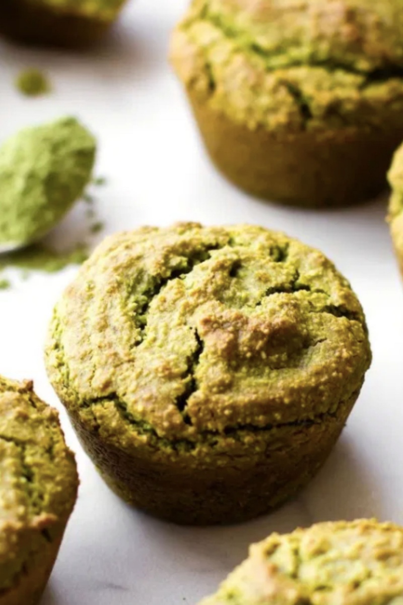 green muffin on white background