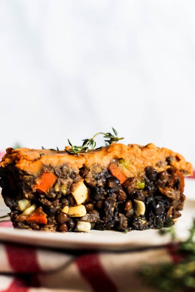 vegan pantry meal of black beans covered in orange sweet potatoes