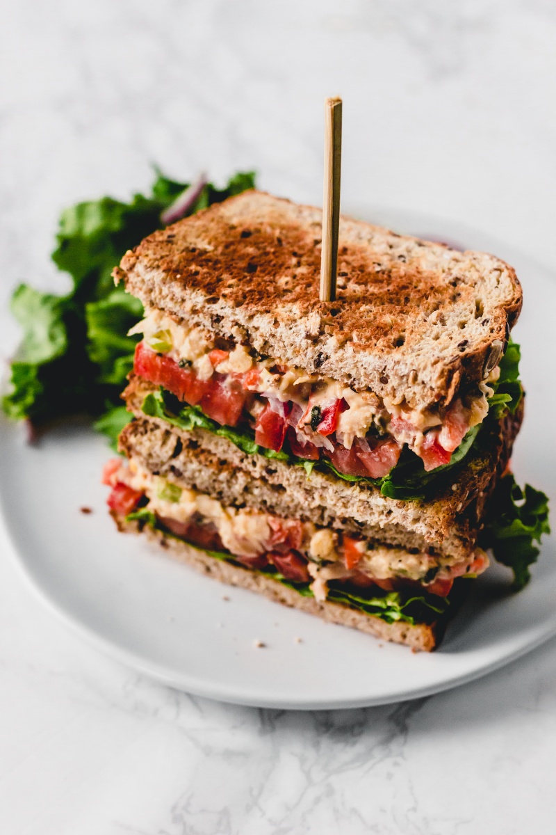 vegan tuna salad sandwich on white plate