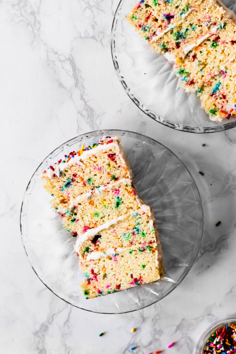 two vegan birthday cake slices