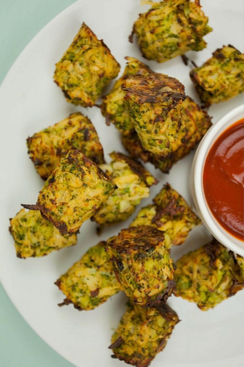 round broccoli tater tots next to ketchup