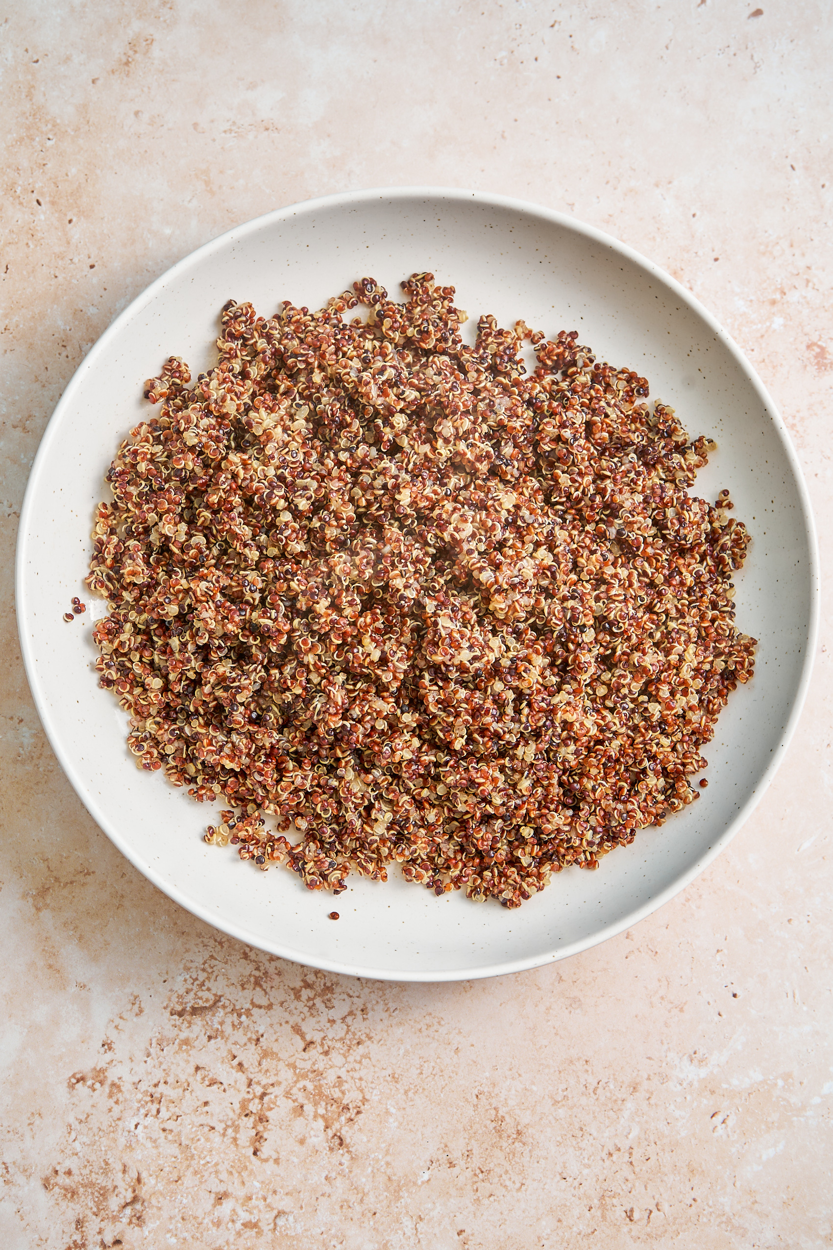 a plate of cooked red quinoa