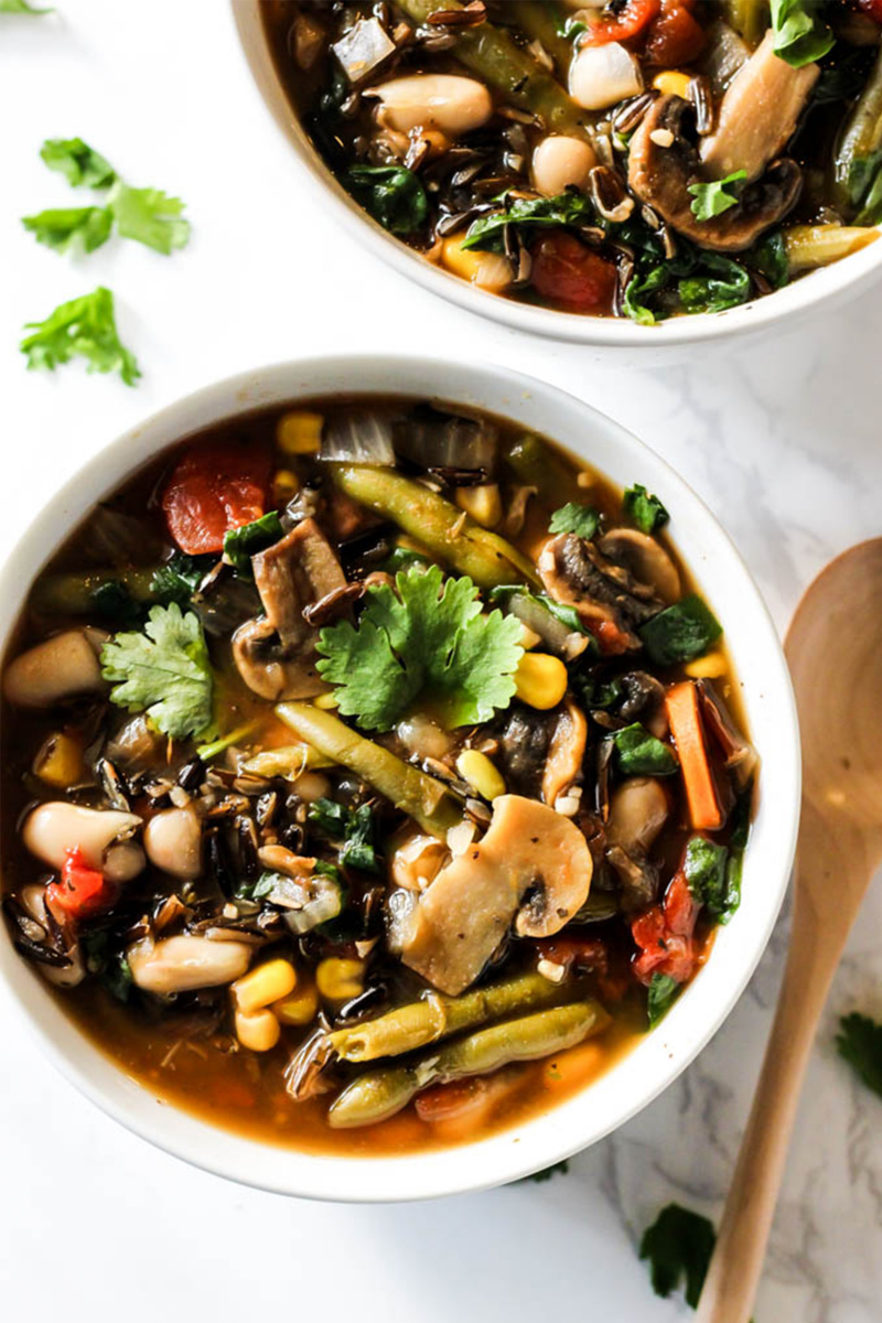 vegan soup with wild rice vegetables and mushrooms 