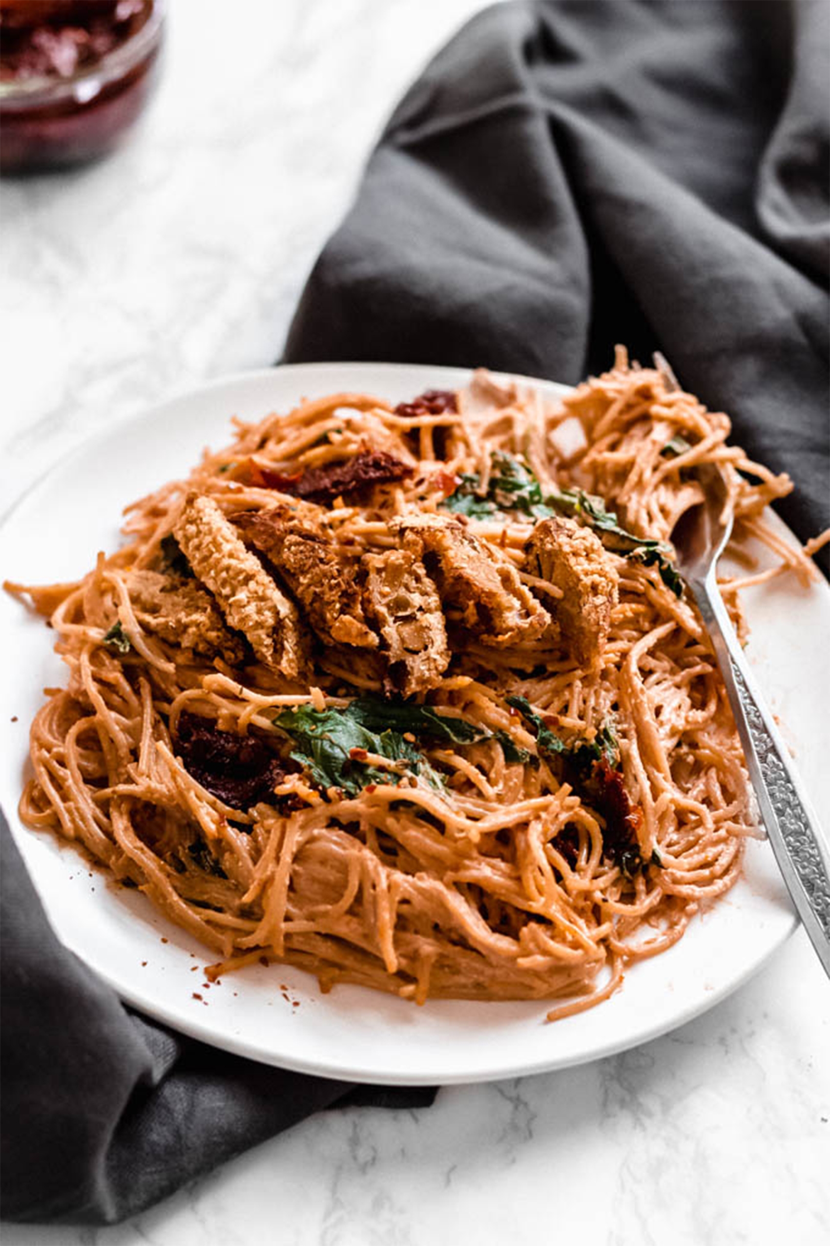 a serving of cashew sun dried tomato pasta 