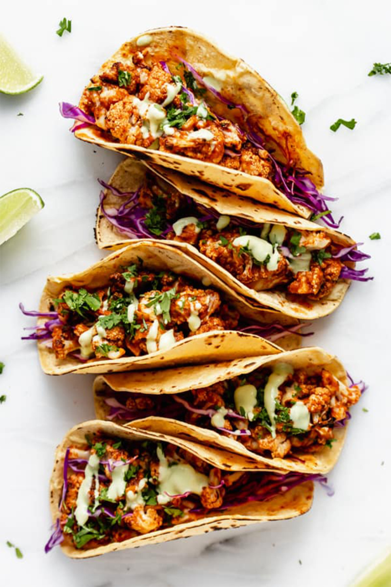 cauliflower tacos topped with cilantro