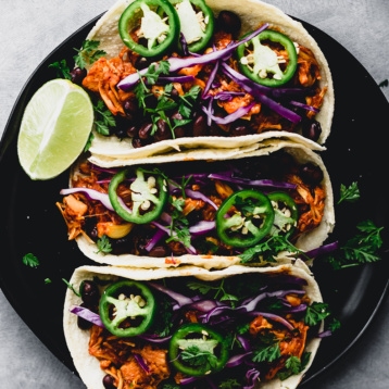 a plate of vegan jackfruit tacos