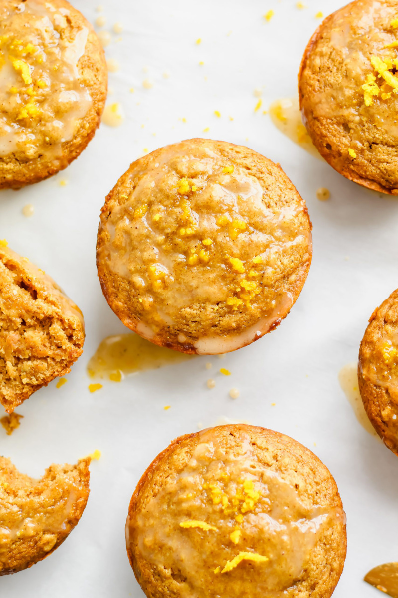 An overhead shot of orange muffins