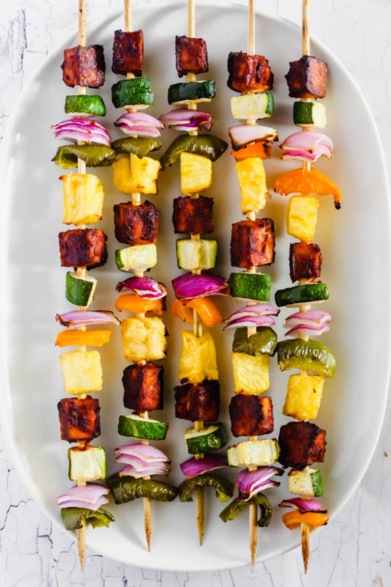 pineapple bbq tofu vegetable skewers served on a white platter