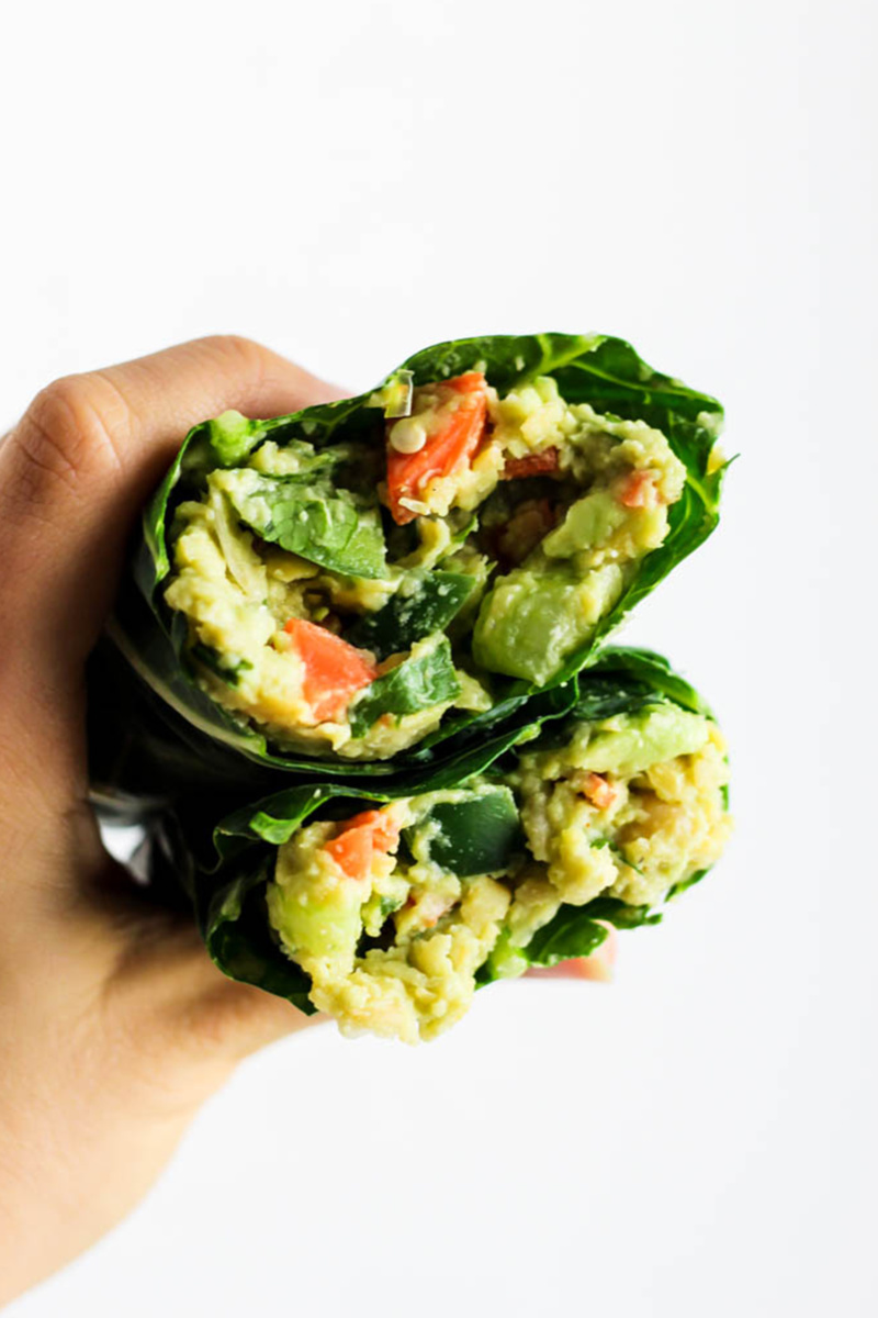 a collard wrap filled with avocado and veggies